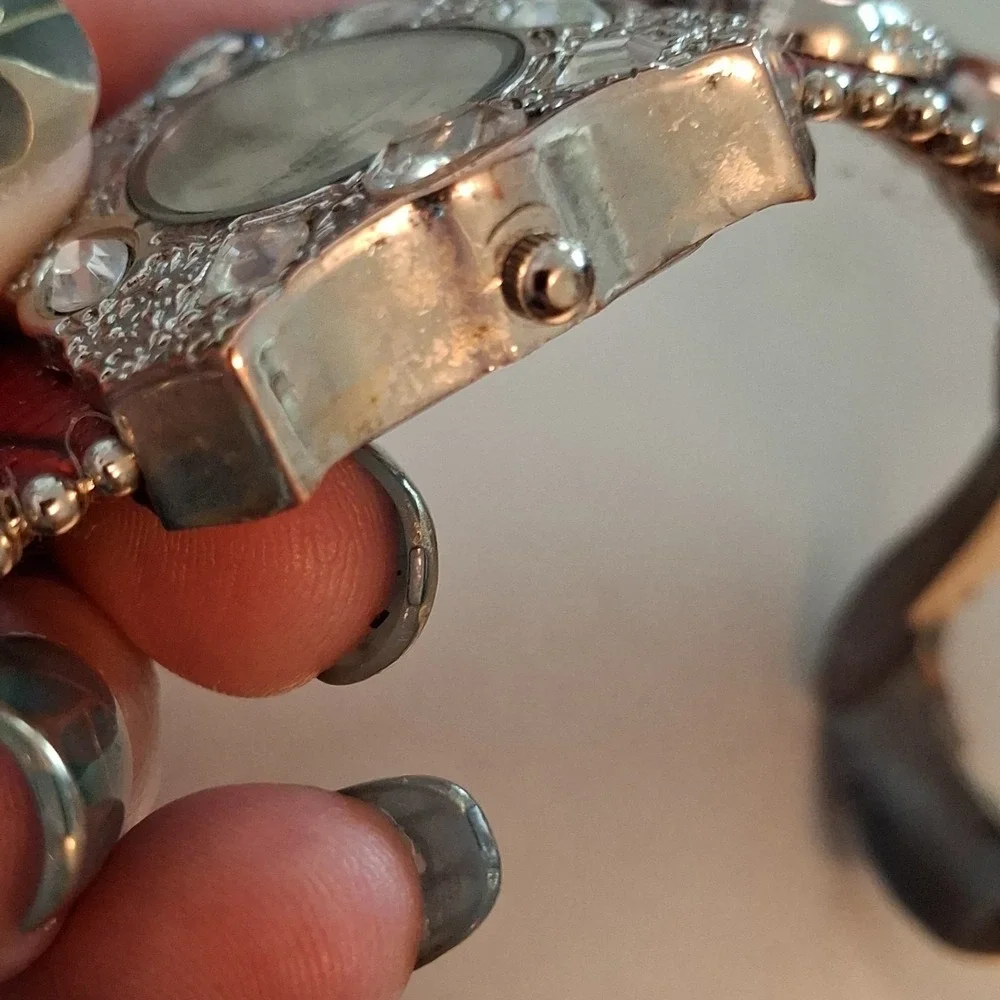 Geneva 92643 Womens Buckle Watch. Red Band, Silvertone,Elephant & Gem Accents.